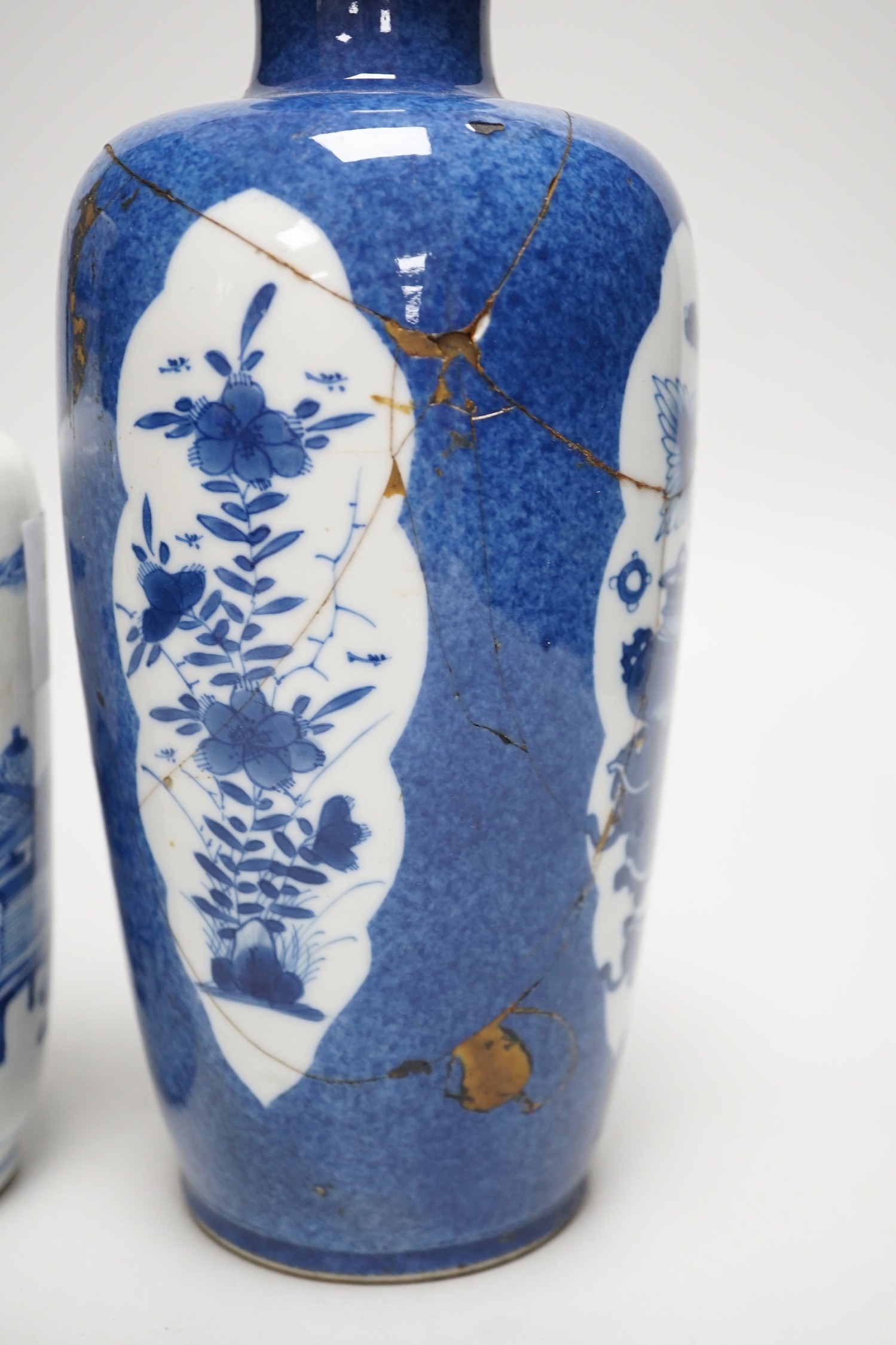 A Chinese blue and white ‘precious objects’ export vase, together with a Chinese powder blue export vase, open vignettes (a.f.) tallest 24.5cms